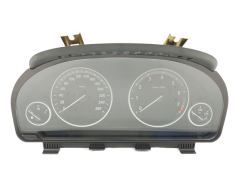 Speedometer/Instrument Cluster BMW X5 9348711-01 2615528-03 Johnson 25058